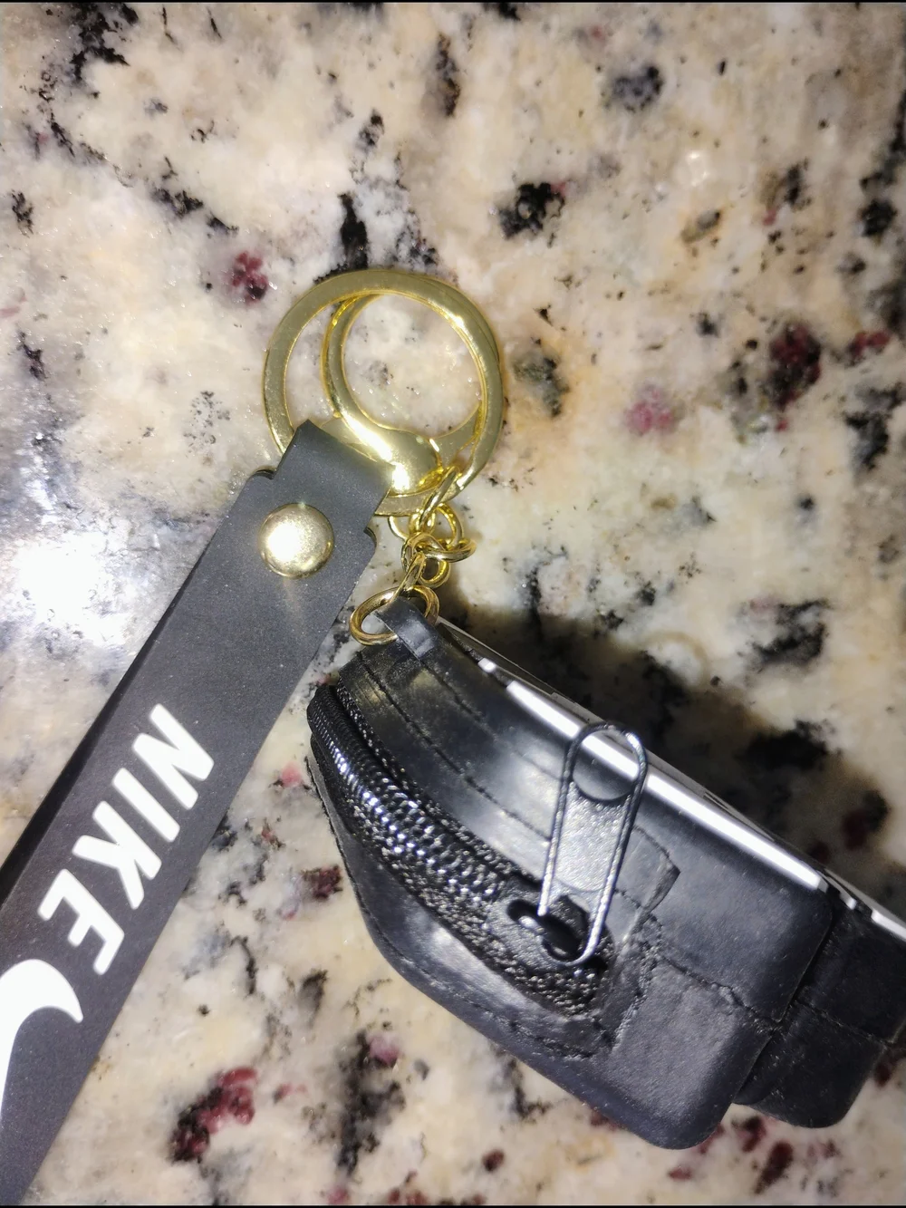 Nike Black and White Sneaker Keychain with Gold Rings